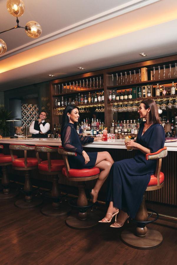 The G Hotel & Spa Galway Exterior foto The bar at the Ritz-Carlton, DIFC